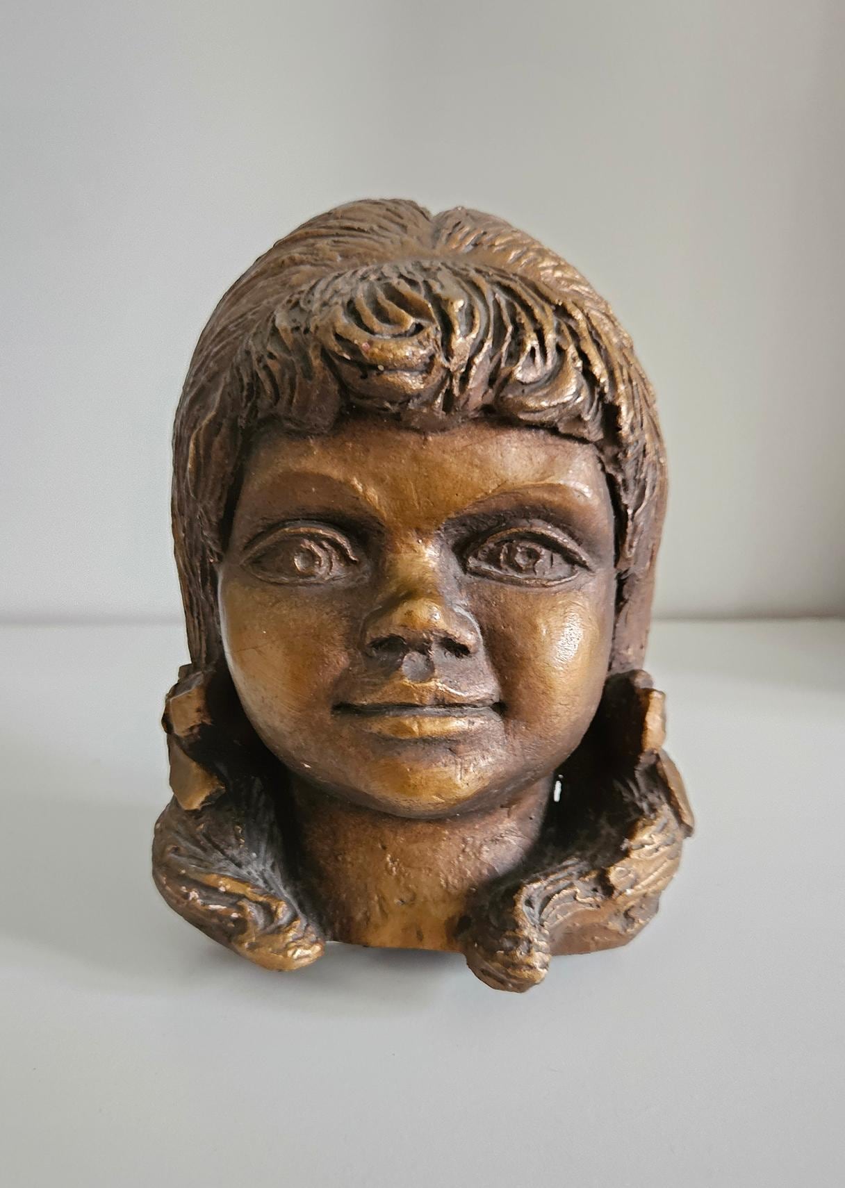Vintage Sculpture Of A Young Girl’s Head With Bow In Hair