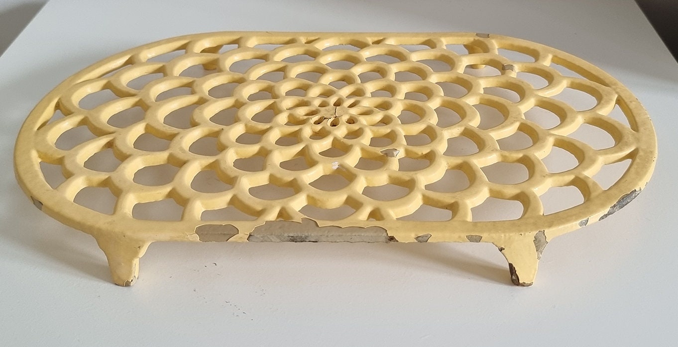 Vintage Pastel Yellow Oval Cast Iron Trivet