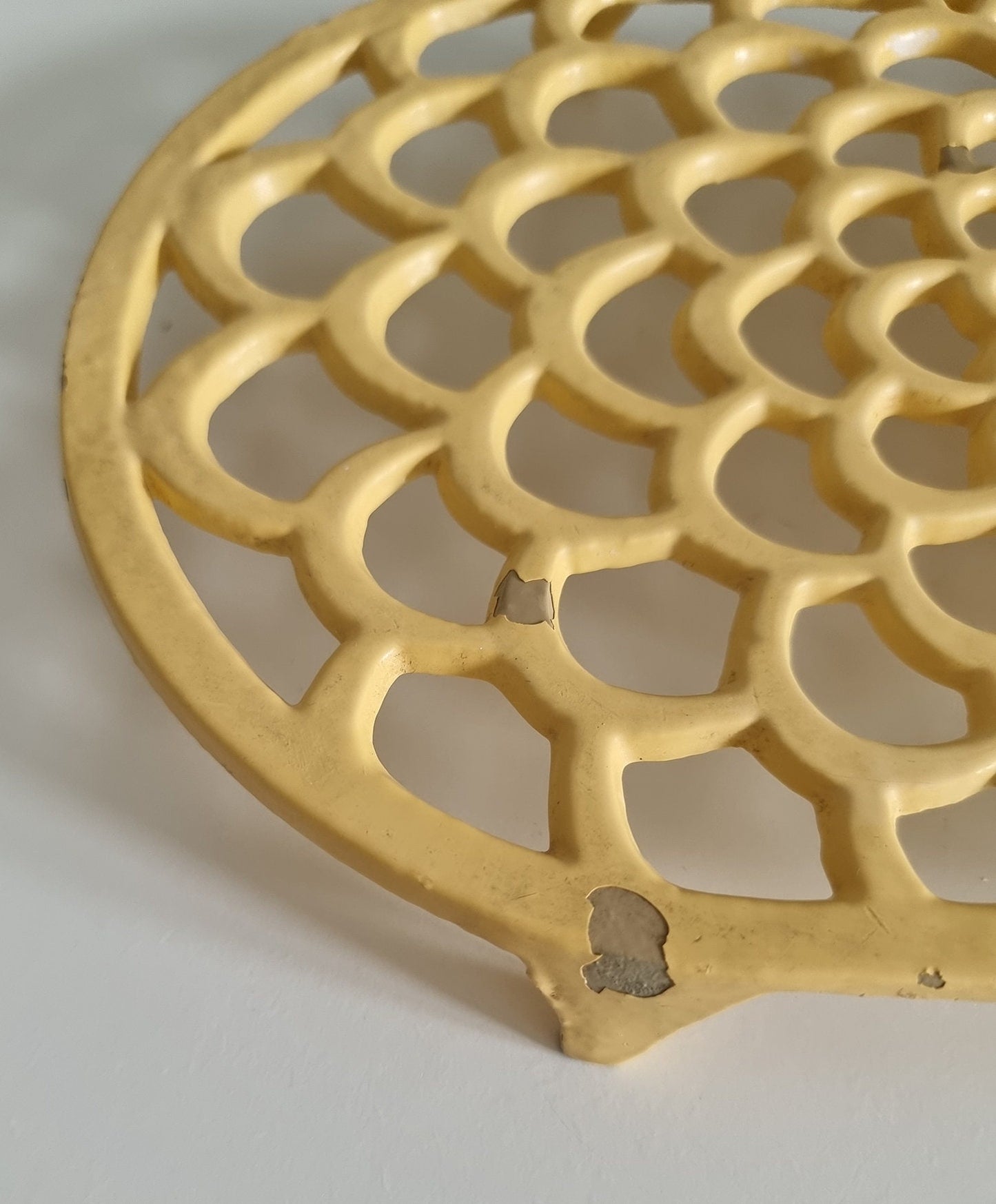 Vintage Pastel Yellow Oval Cast Iron Trivet