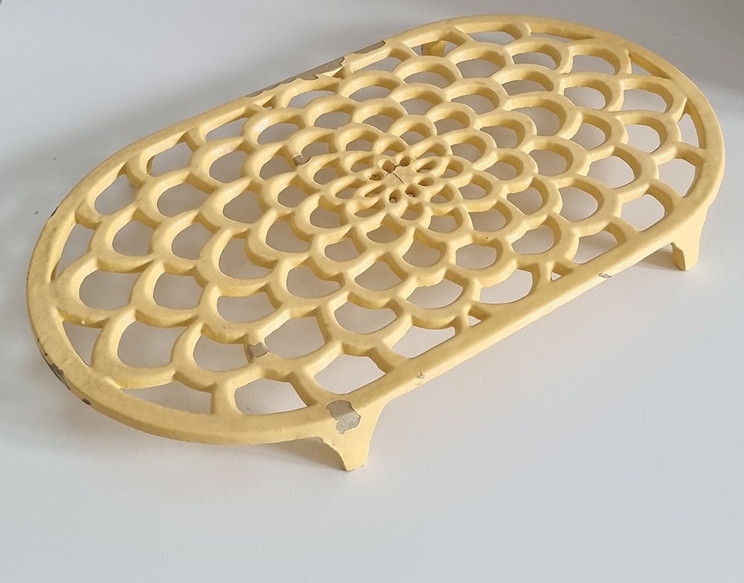 Vintage Pastel Yellow Oval Cast Iron Trivet