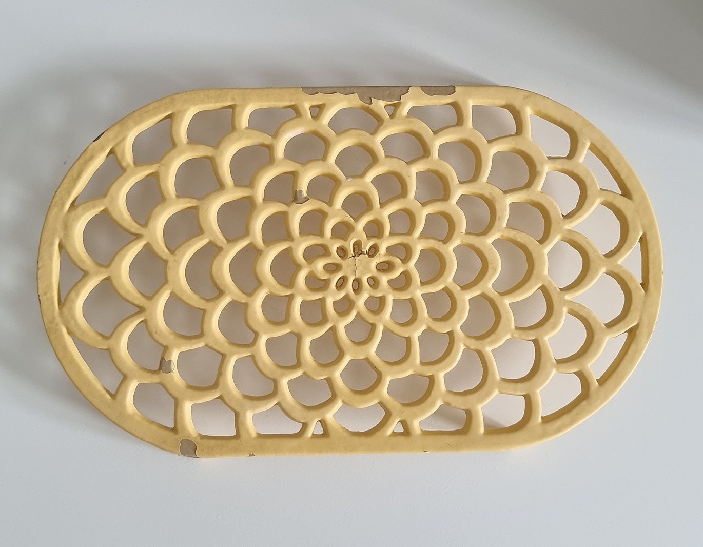 Vintage Pastel Yellow Oval Cast Iron Trivet