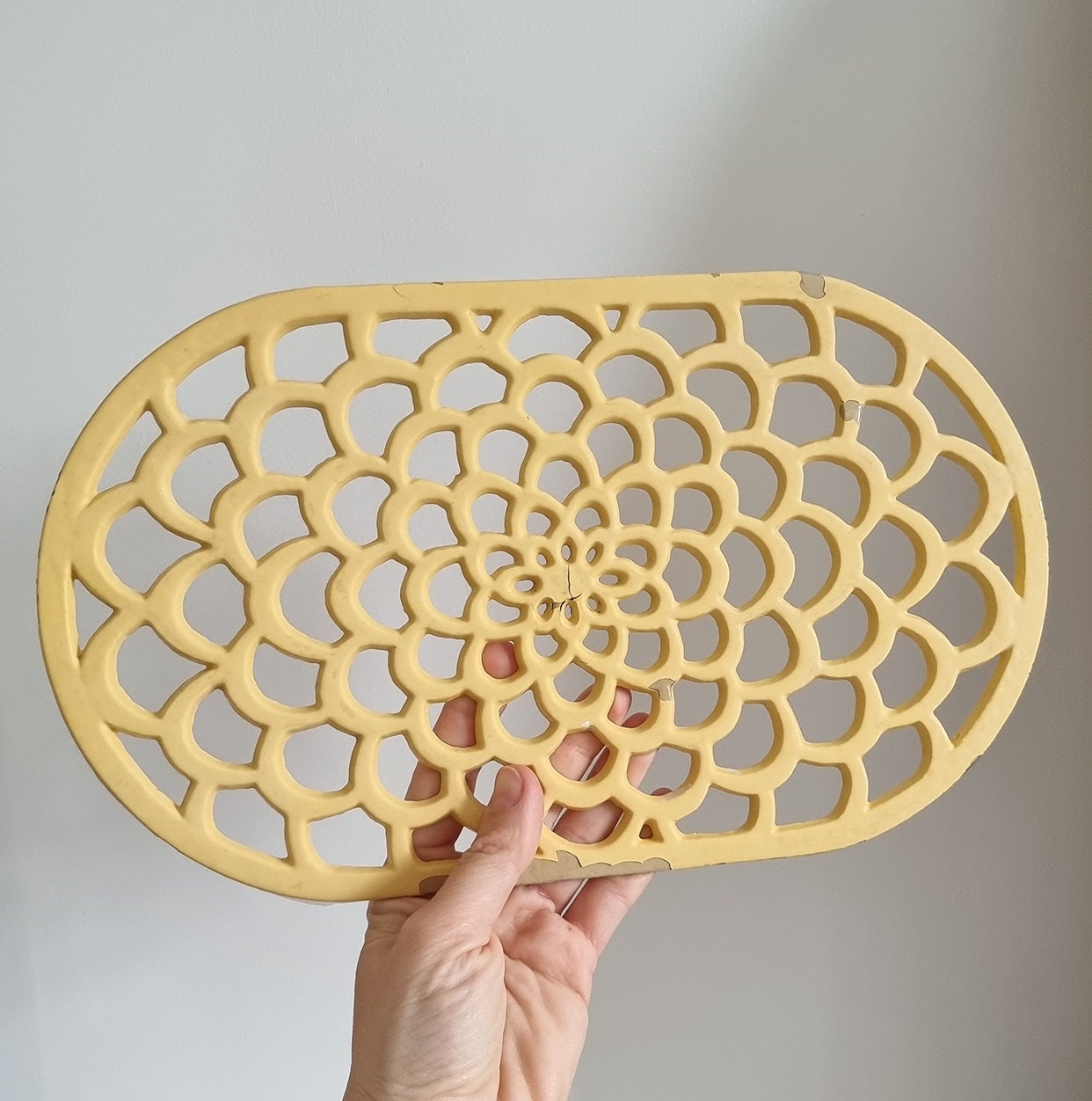 Vintage Pastel Yellow Oval Cast Iron Trivet