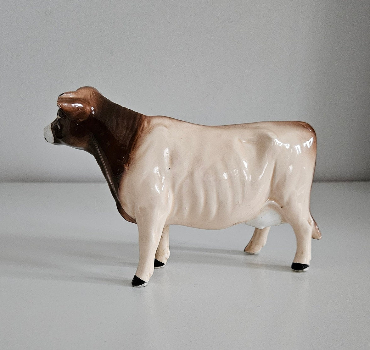 Vintage Porcelain Cow Figurine