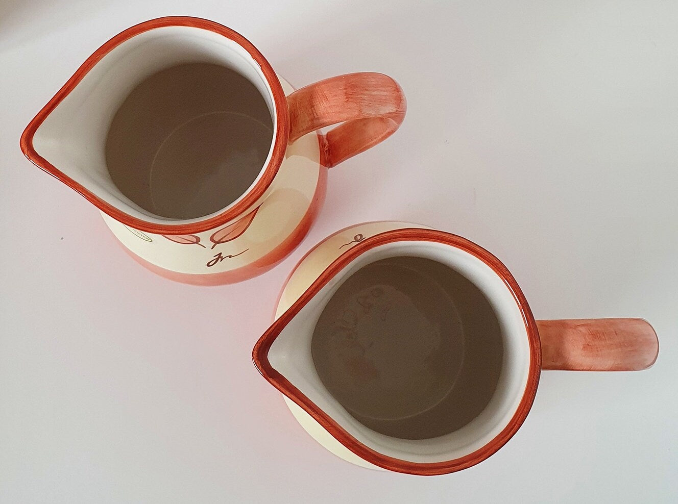 Set Of Two Hand Painted Leaf Design Ceramic Jugs