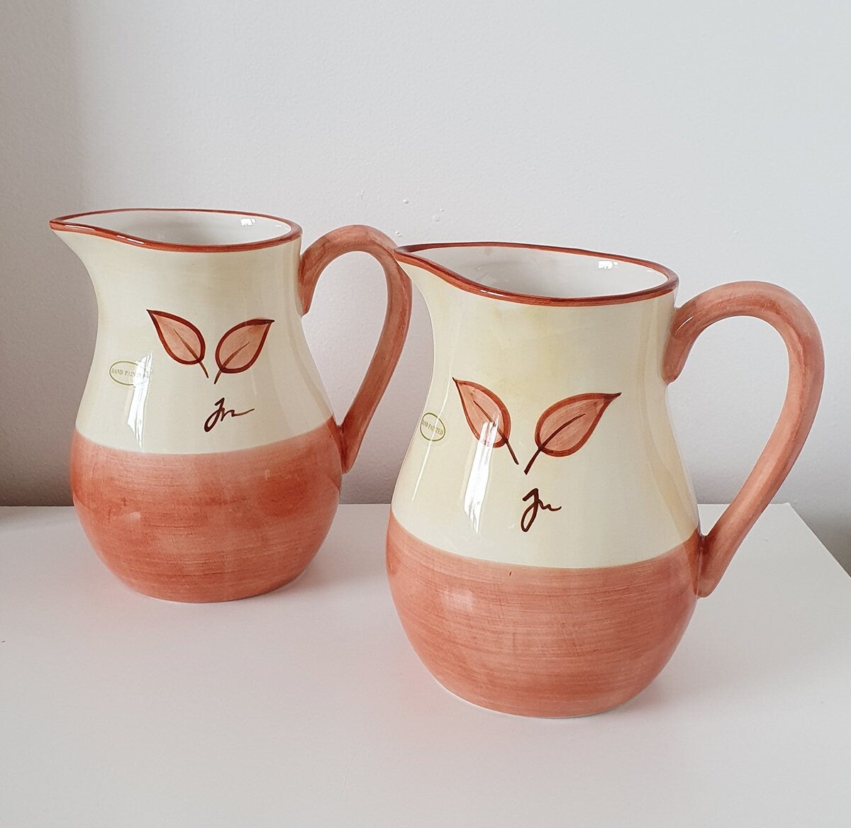 Set Of Two Hand Painted Leaf Design Ceramic Jugs