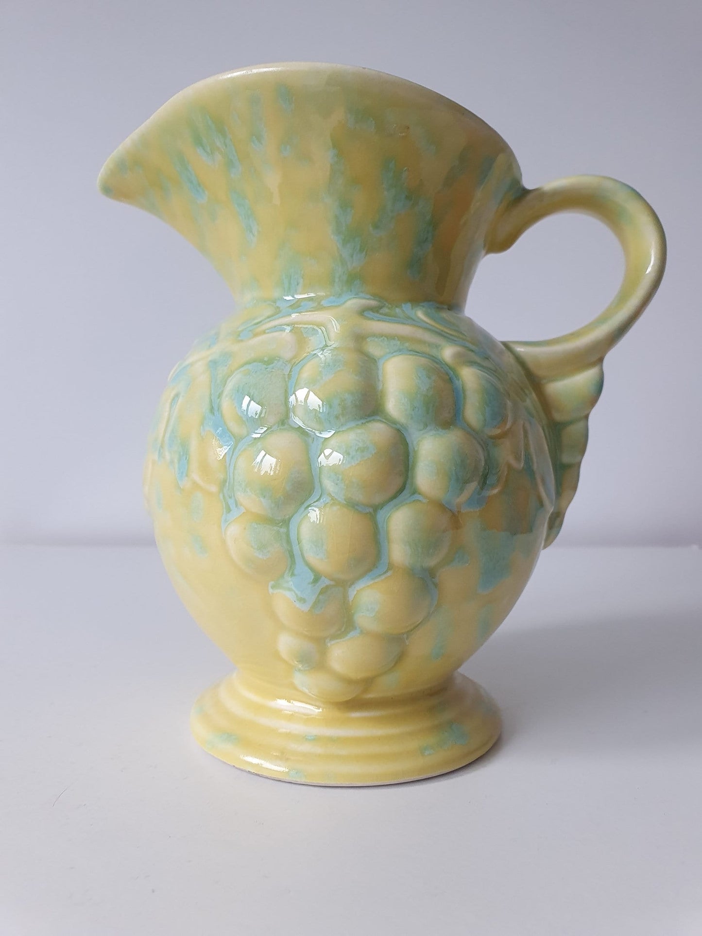 Vintage Wine Jug In Pastel Yellow Colour With Grape Design