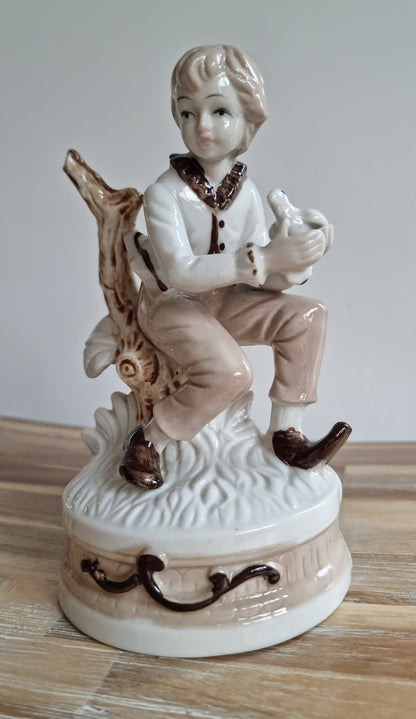 Vintage Porcelain Boy With Bird Figurine