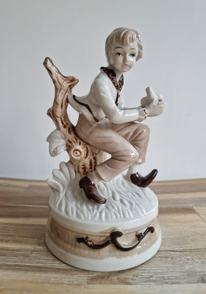 Vintage Porcelain Boy With Bird Figurine