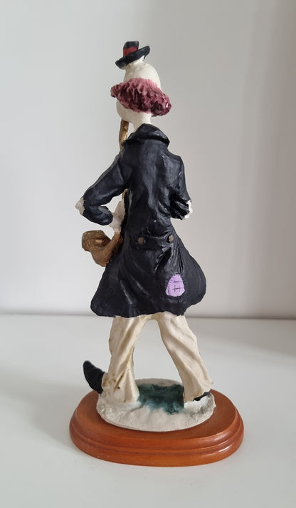 Vintage Woolbro Clown Playing Saxophone Figurine