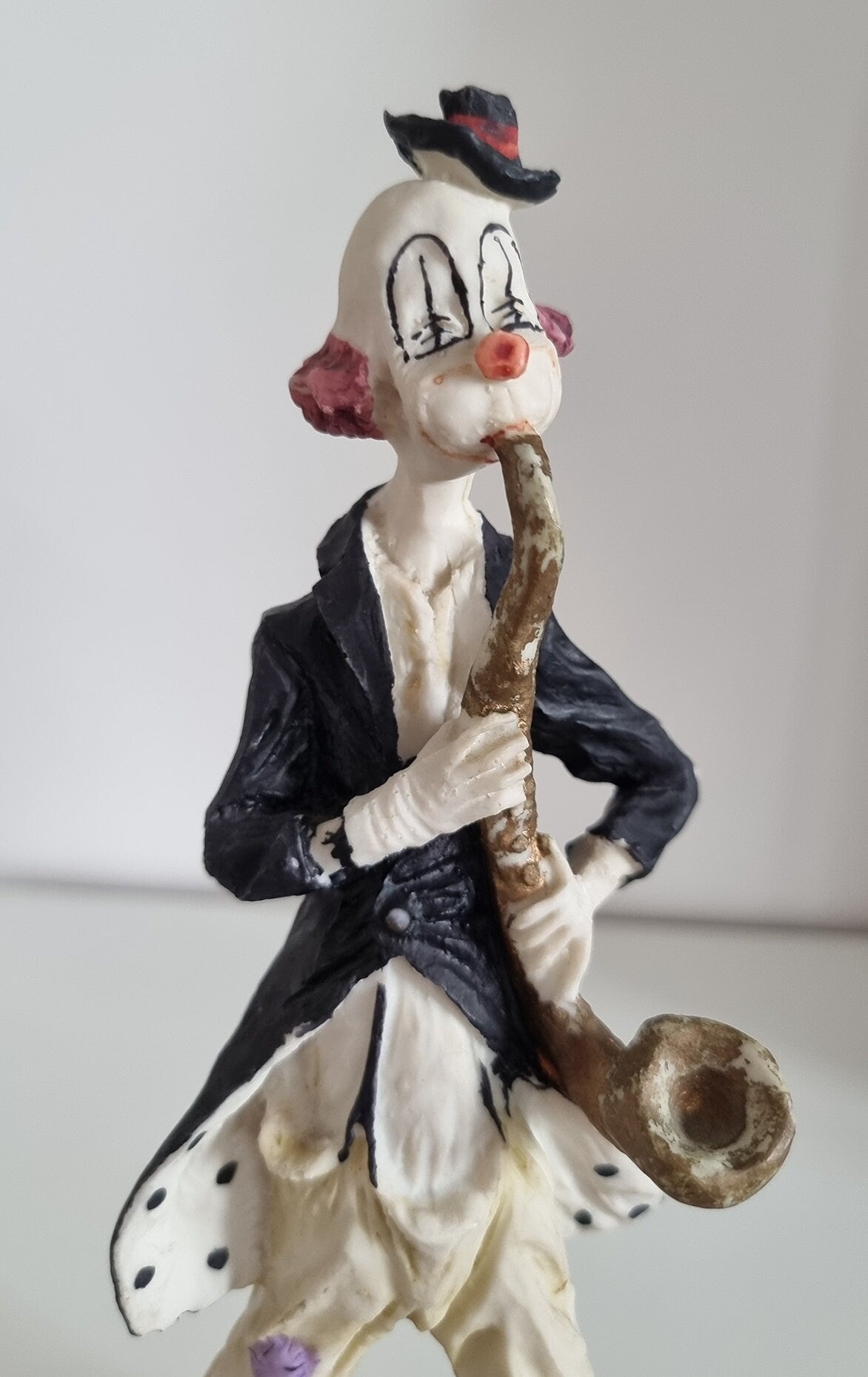 Vintage Woolbro Clown Playing Saxophone Figurine