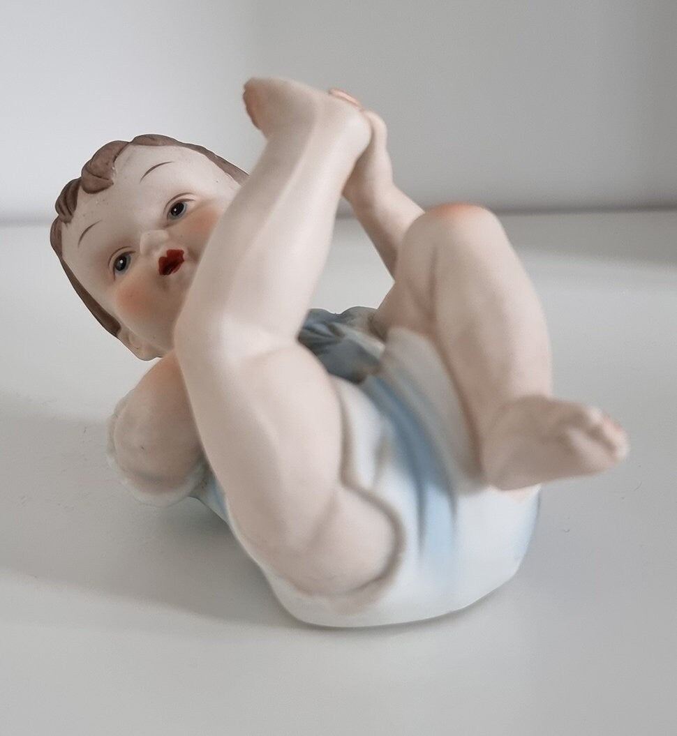 Lovely Vintage Bisque Porcelain Piano Baby Boy Figurine