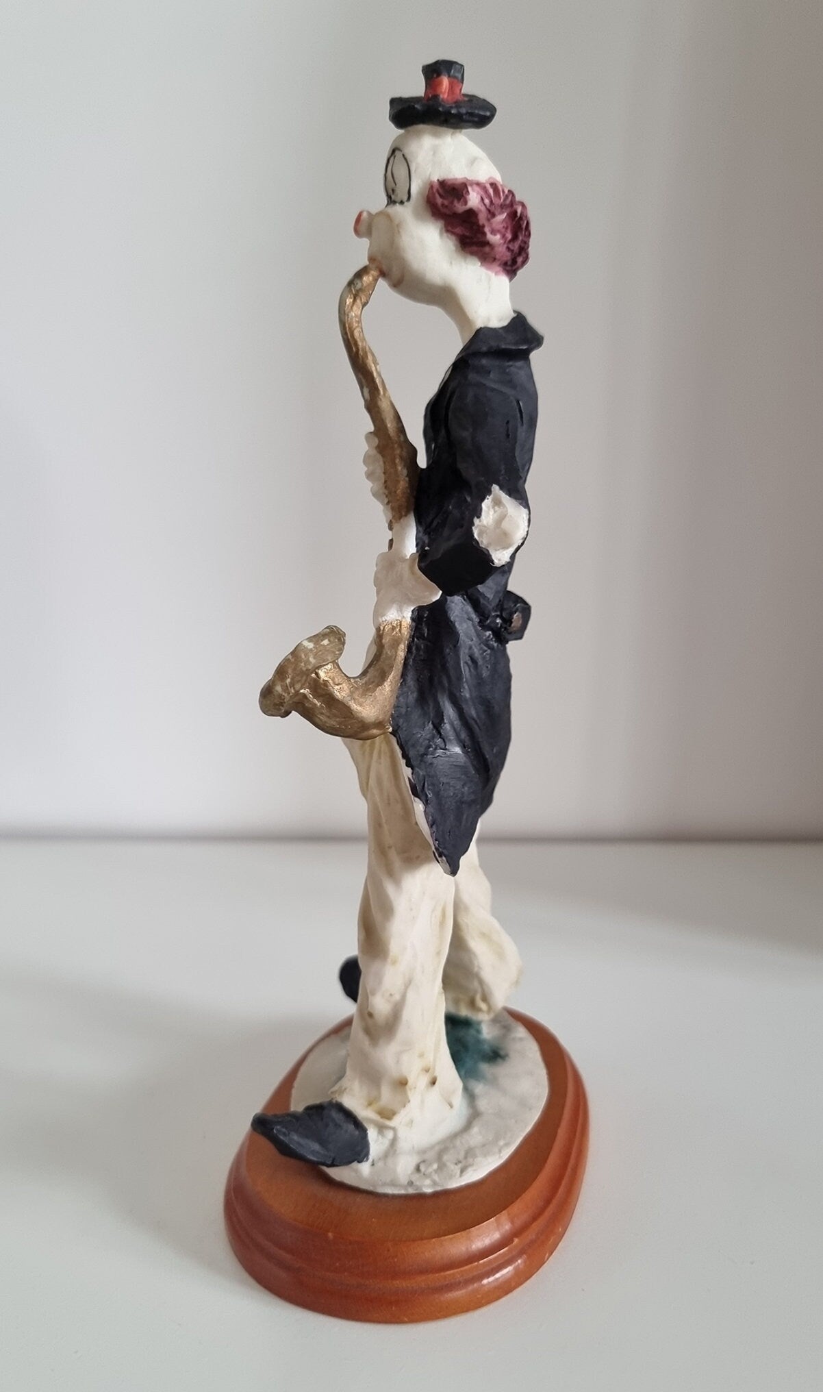 Vintage Woolbro Clown Playing Saxophone Figurine