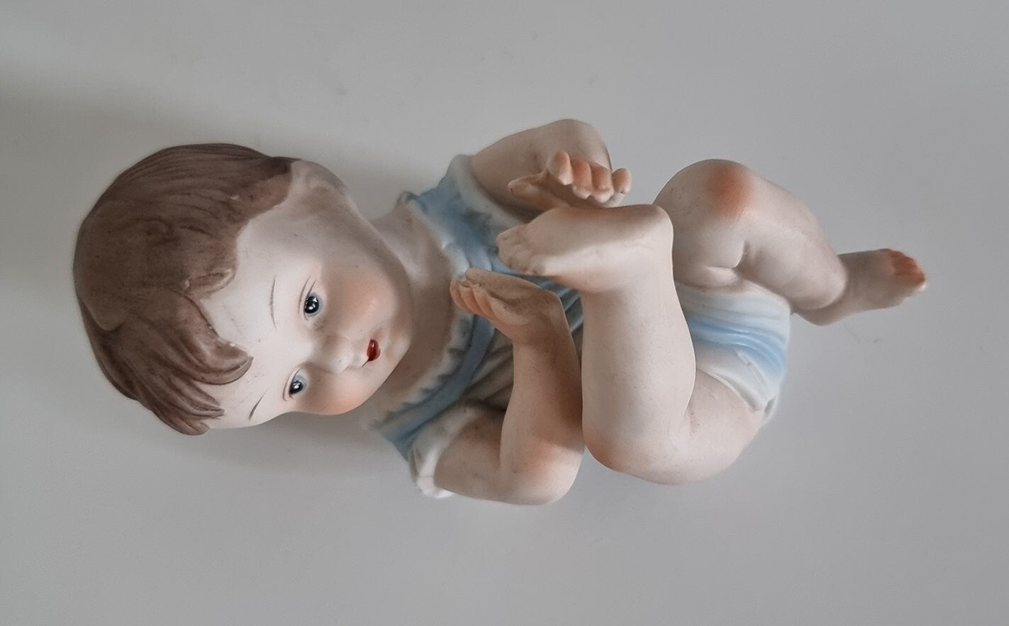 Lovely Vintage Bisque Porcelain Piano Baby Boy Figurine