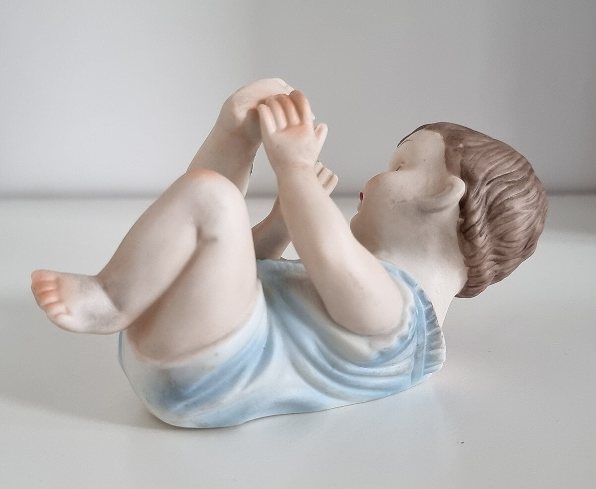 Lovely Vintage Bisque Porcelain Piano Baby Boy Figurine