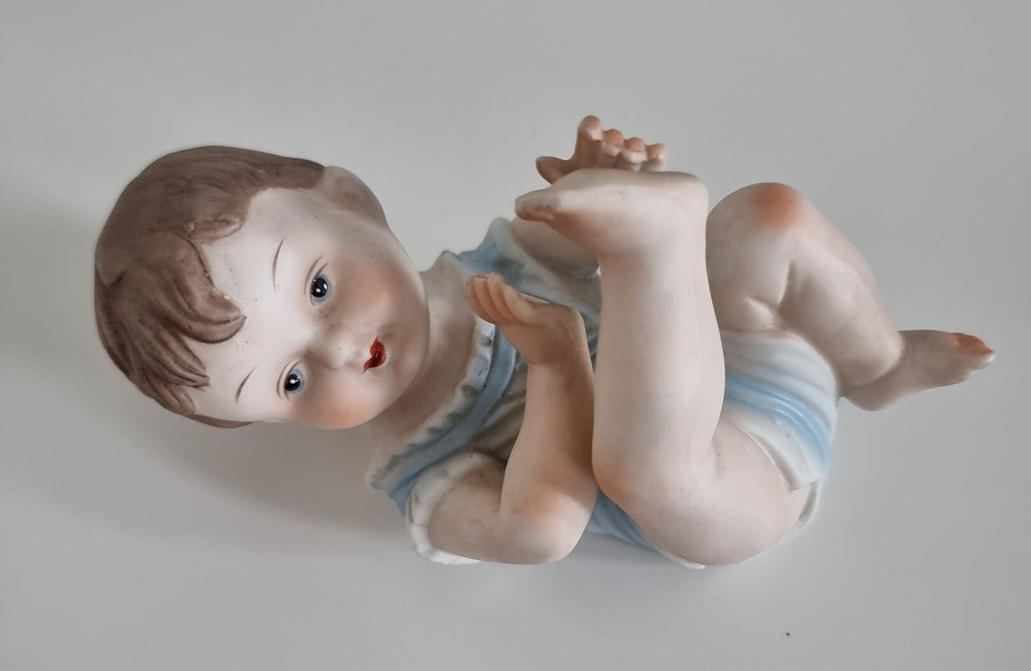 Lovely Vintage Bisque Porcelain Piano Baby Boy Figurine