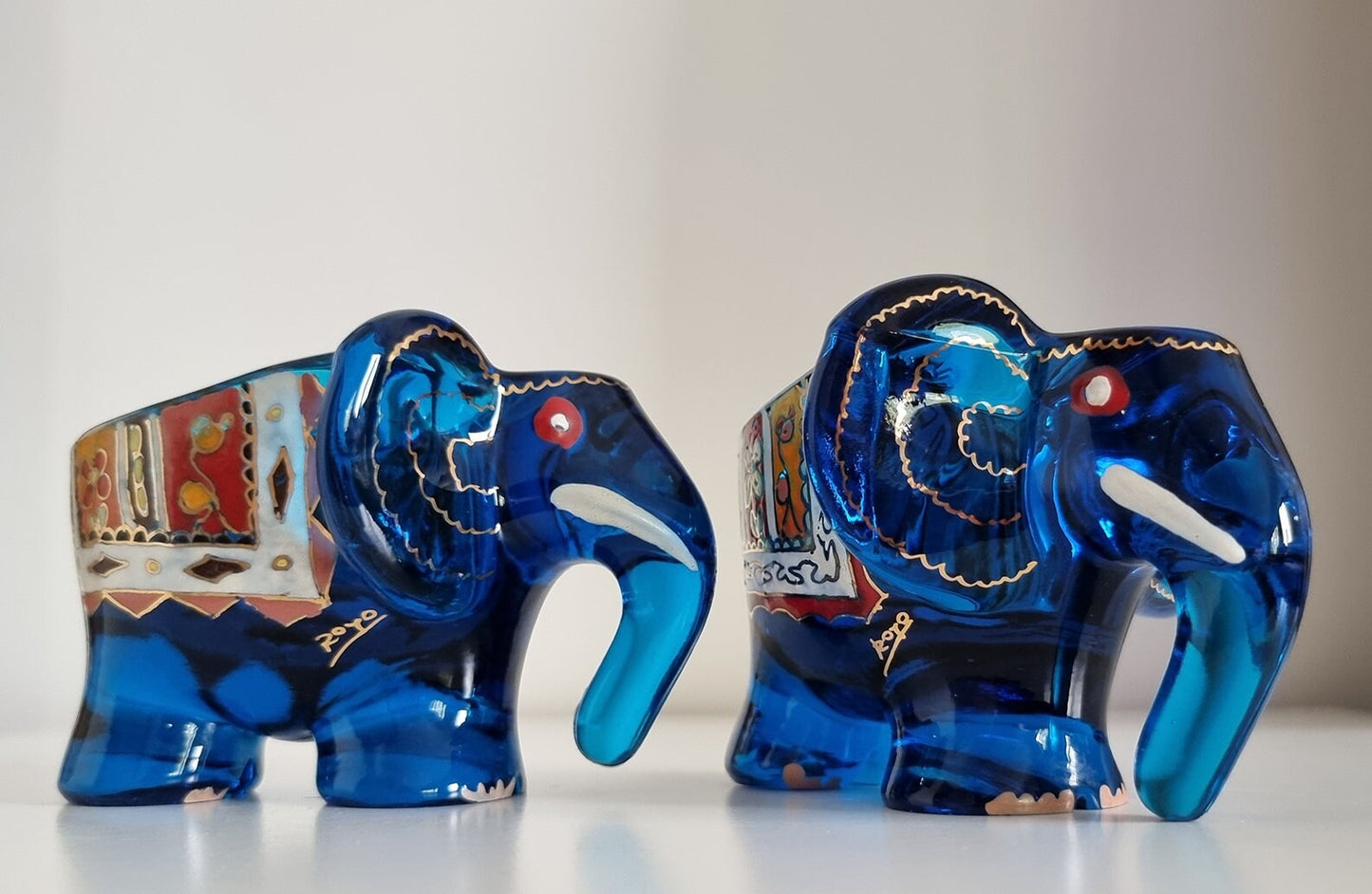 Pair Of Jose Cire Royo Blue Enamelled Glass Elephants